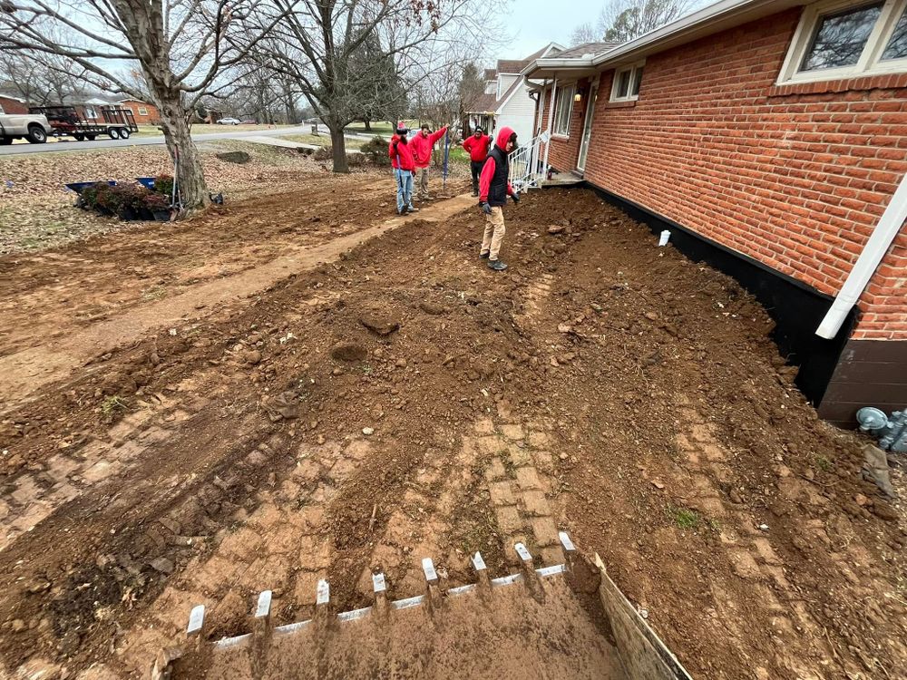 Our Land Grading service ensures a smooth, even surface by expertly removing tree stumps and leveling your outdoor space, preparing it for beautiful landscaping or hardscaping projects that elevate your home's curb appeal. for Real Deal Lawn Care in Goodlettsville, TN