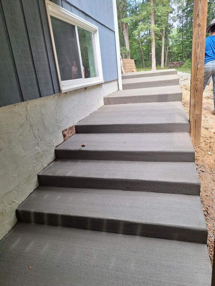 Our Stair Design & Installation service offers personalized concrete stair solutions, enhancing your home's beauty and safety with durable, expertly crafted designs tailored to fit any space and style preference seamlessly. for Rivera Concrete INC. in Greensboro, NC