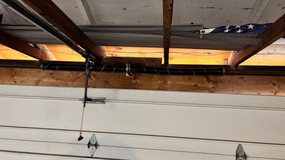 Garage door torsion spring change for Thomas Enterprise Group  in Wintersville, OH