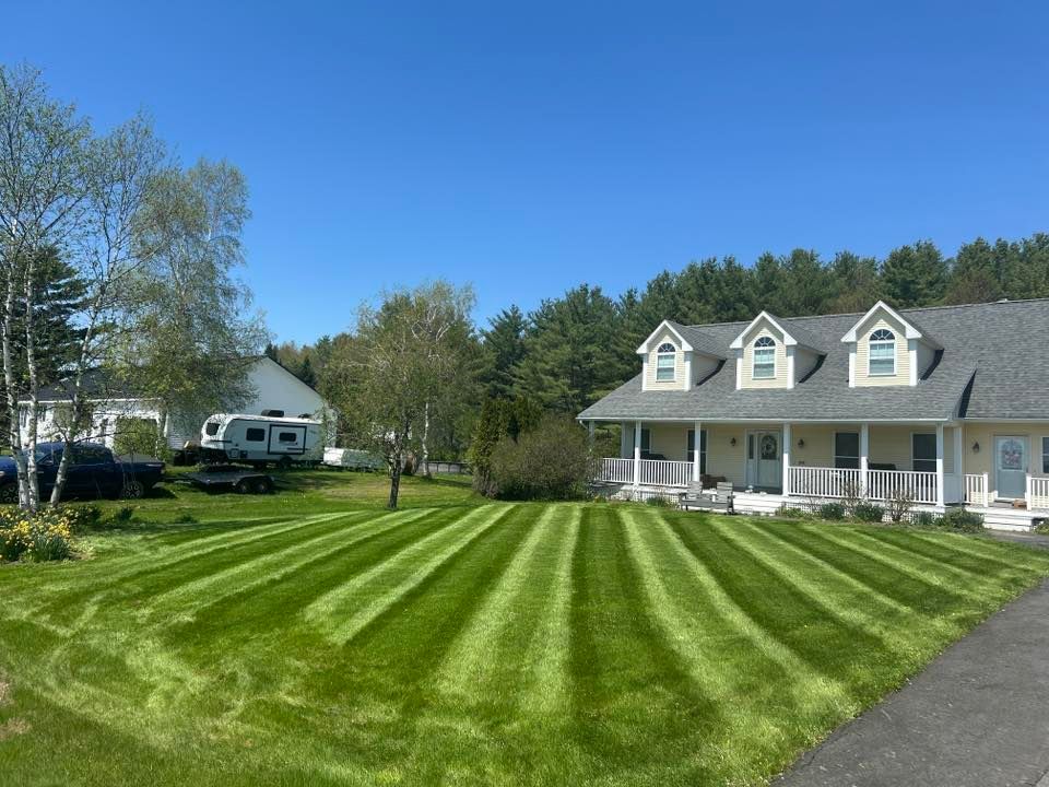 Our professional mowing service ensures a perfectly manicured lawn, enhancing your home's curb appeal with precision cutting, edging, and clean-up for a lush, healthy outdoor space you'll love. for CM & Sons Landscaping LLC in Benton, ME