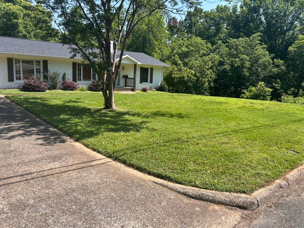 Our edging and trimming service enhances your landscape's appearance with precision care, ensuring clean lines, well-defined borders, and a neat look that adds curb appeal to your home effortlessly. for Land Legends Landscapes LLC in Kings Mountain, NC