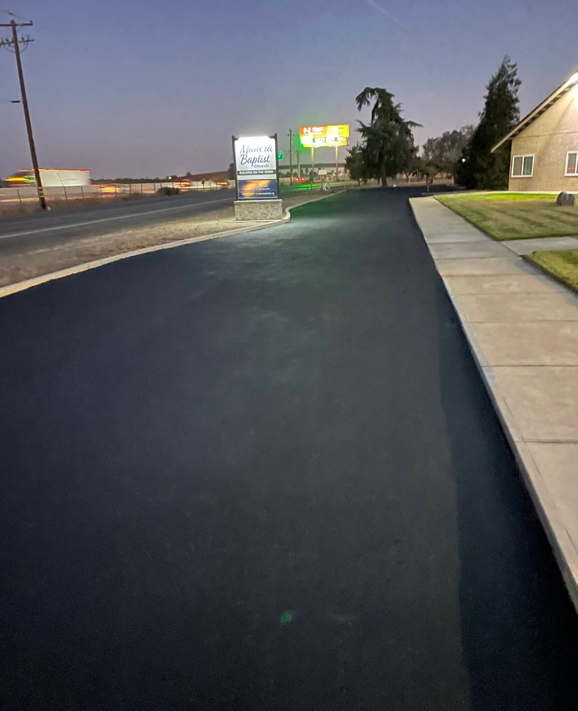 Enhance your home's curb appeal with our expert roadway paving service, offering durable asphalt solutions for smooth, long-lasting surfaces that withstand weather elements and increase your property's value and safety. for AGM Paving in Fresno, CA