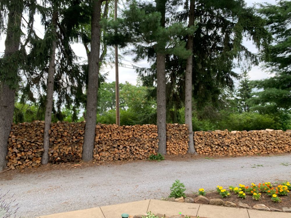 We offer premium firewood pick up and delivery service for cozy home fires. Our seasoned hardwoods ensure a warm and inviting atmosphere, perfect for relaxing evenings in your backyard or living room. for Trueman Landscaping in Wexford, PA