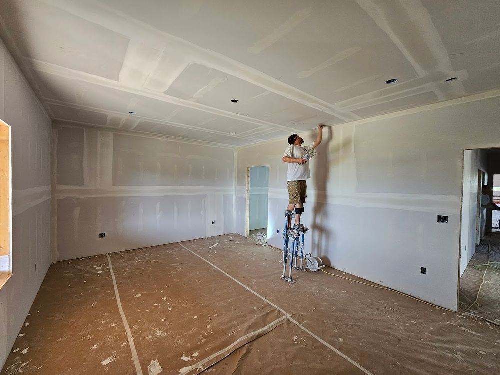 Our professional drywall finishing service ensures a smooth and flawless surface for painting. We expertly repair imperfections, tape joints, sand surfaces, and apply primer to achieve a perfect paint-ready finish. for Stallman Drywall in Morris,  MN