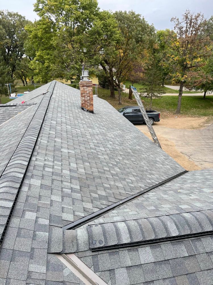 Our Roofing Installation & Repair service protects your home with durable materials, expert craftsmanship, and reliable repairs, delivering long-lasting performance, improved curb appeal, and peace of mind in every season. for Heike Construction LLC in De Graff, MN