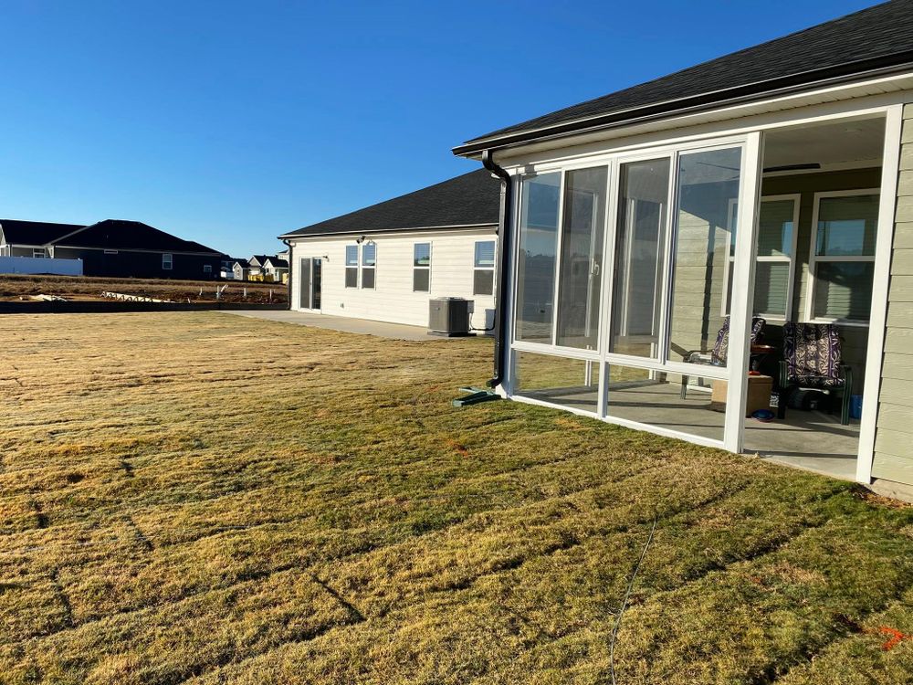 Our residential lawn care services enhance your home's outdoor beauty with expert maintenance, including mowing, fertilization, and weed control—ensuring a lush and healthy lawn all year round. for Superior Lawn Solution in Coats, NC