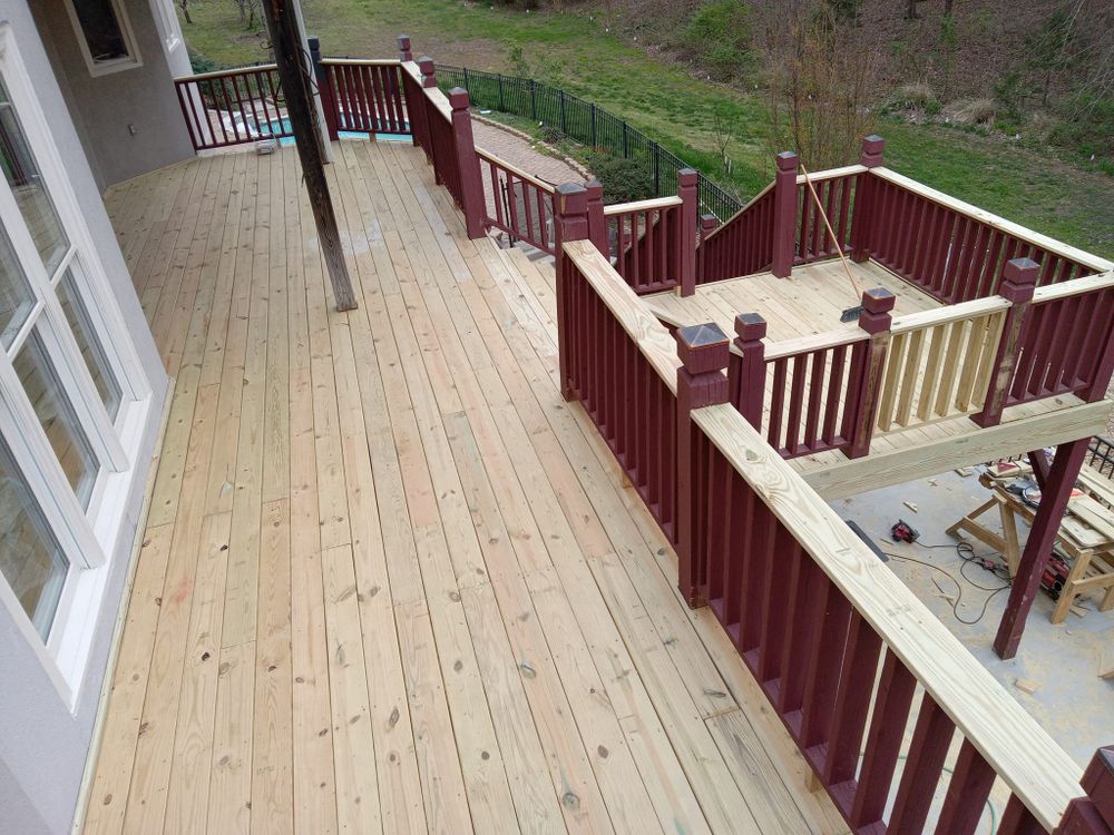 Transform your outdoor space with our expert Deck & Patio Installation service, offering durable materials and customized designs to enhance aesthetics and functionality for an inviting backyard oasis perfect for relaxation or entertaining. for Iron Man Construction in Charlotte, NC