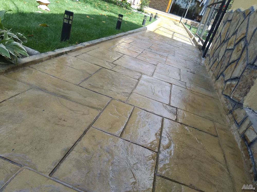 Transform your outdoor spaces with our expertly crafted stamped concrete installation service, offering durable, custom-designed patios and driveways that enhance curb appeal and mimic the beauty of natural stone. for Joey's concrete solutions in Gainesville, FL