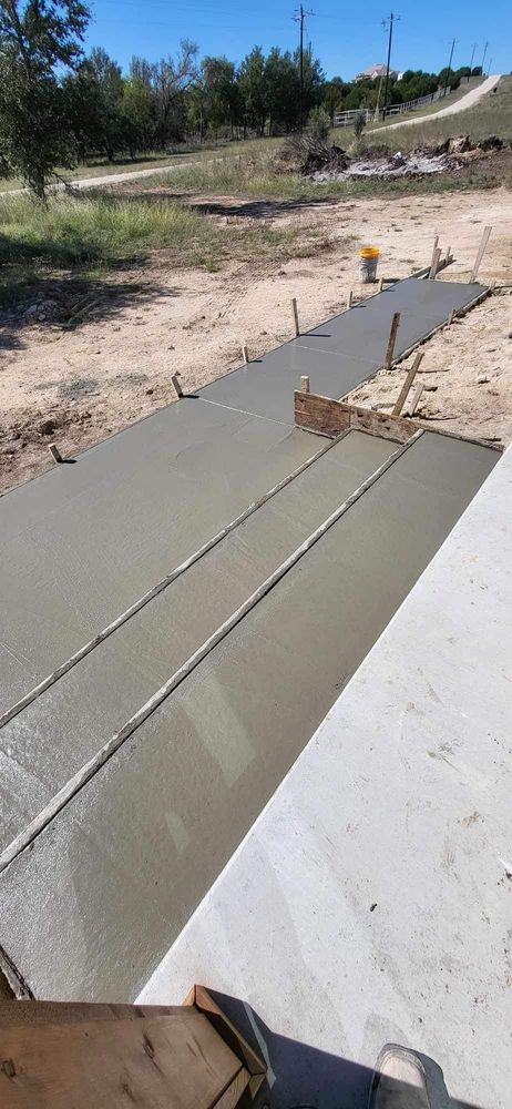 Our expert stair design and installation service ensures durable, aesthetically pleasing concrete stairs. We specialize in integrating functional culverts for optimal water drainage, enhancing home safety and outdoor appeal. for PC Concrete & Design in Austin, TX