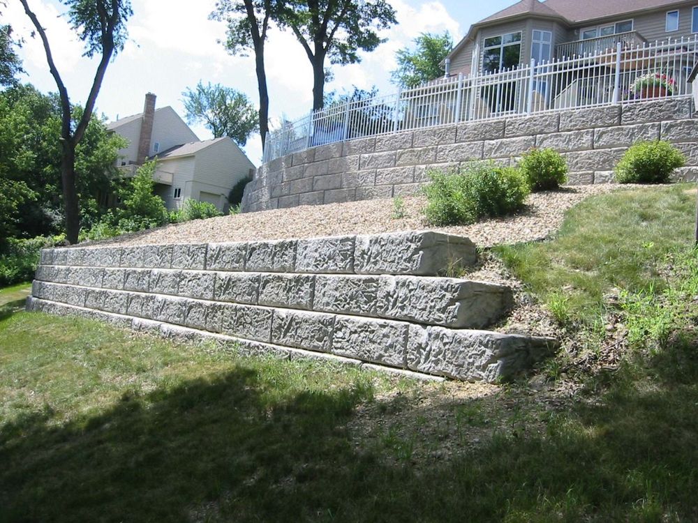 Our Large Retaining Walls service provides durable and visually appealing solutions to prevent soil erosion, enhance landscape design, and maximize usable space in your yard with expert installation by our skilled team. for Preferred Excavating & Demolition in Somerset County, NJ
