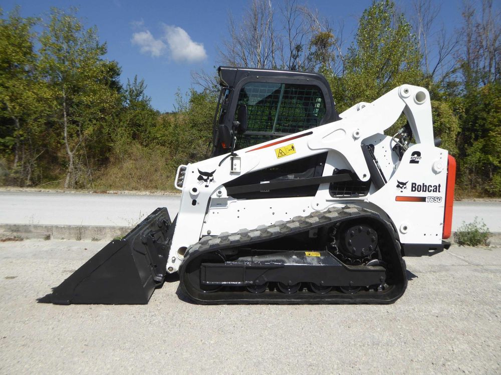 Our Bobcat Service provides efficient land clearing and debris removal, ensuring your property is clean and ready for any landscaping or construction projects. Enhance your outdoor space with our professional expertise. for A Southern Style Tree Service in Orlando, FL