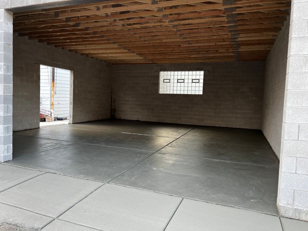 Our Garage concrete floors service offers expert concrete slab construction to homeowners, ensuring durable and visually appealing floors that enhance the functionality and aesthetics of your garage space. for Onyx Concrete Contractors in Chicago, IL