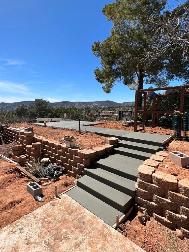 Our Stair Design & Installation service offers homeowners the opportunity to enhance their property with durable and stylish concrete stairs, expertly crafted to elevate the aesthetics and functionality of their home. for Church Concrete in Rimrock, AZ