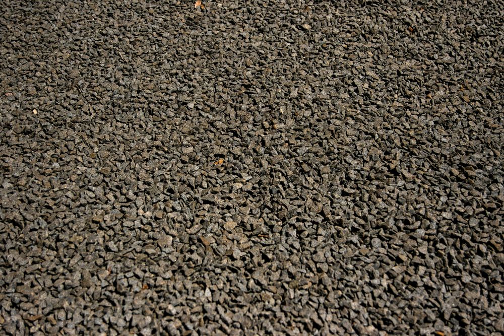 Our Gravel Driveways service offers expert driveway installation, providing homeowners with durable and aesthetically pleasing pathways. Our team ensures a smooth process from clearing to finishing touches, enhancing your property's accessibility and appeal. for Maverick's Land Services  in Elwood, IN