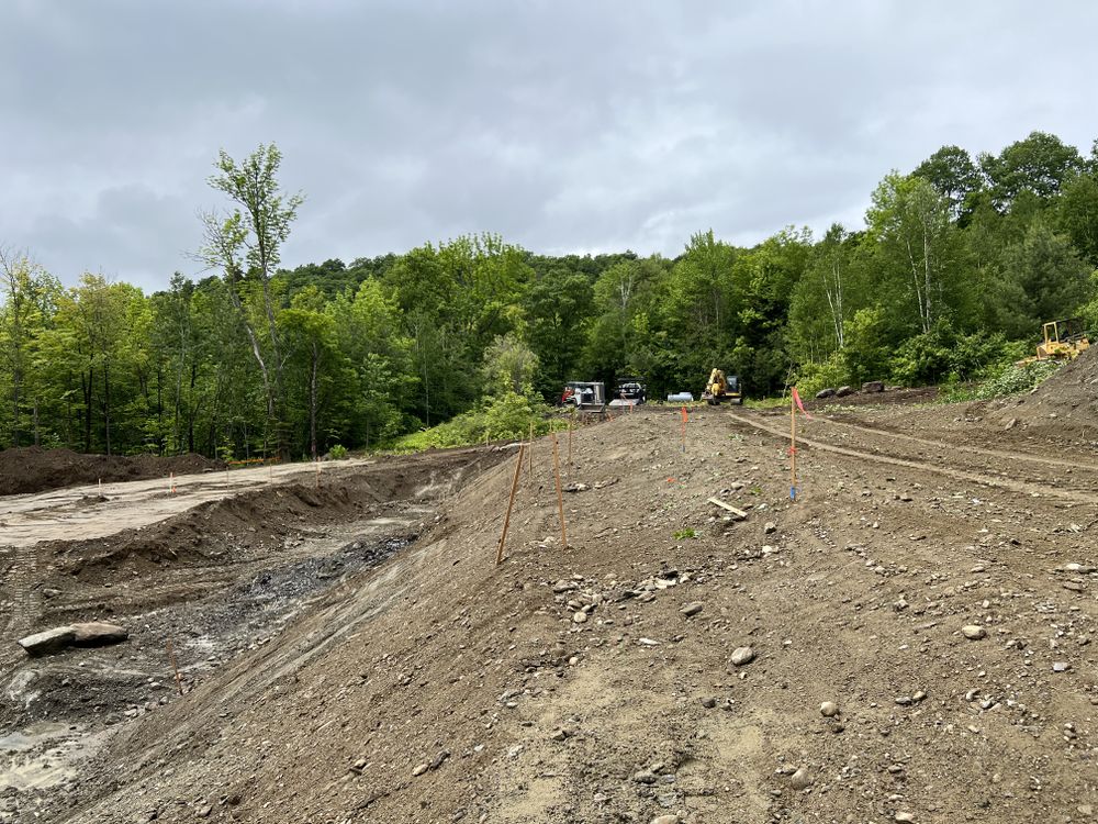 Carving a Pond into a Mountain Side for Andy Naylor Excavation in Johnson, VT