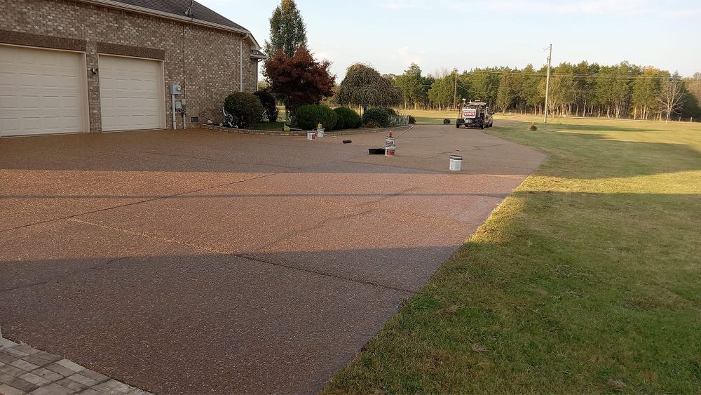 Protect and enhance the longevity of your driveway with our professional sealing service. Our experts apply a high-quality sealant to shield against damage from harsh weather conditions, oil leaks, and stains. for Quality Painting & Pressure Washing in Mt. Juliet, TN