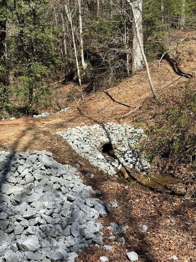 Our Sewer & Water Lines service ensures efficient and reliable installation, repair, and maintenance of underground piping systems, safeguarding your home's plumbing integrity with precision excavation by our experienced team. for OCD Landworks in Lenoir, NC