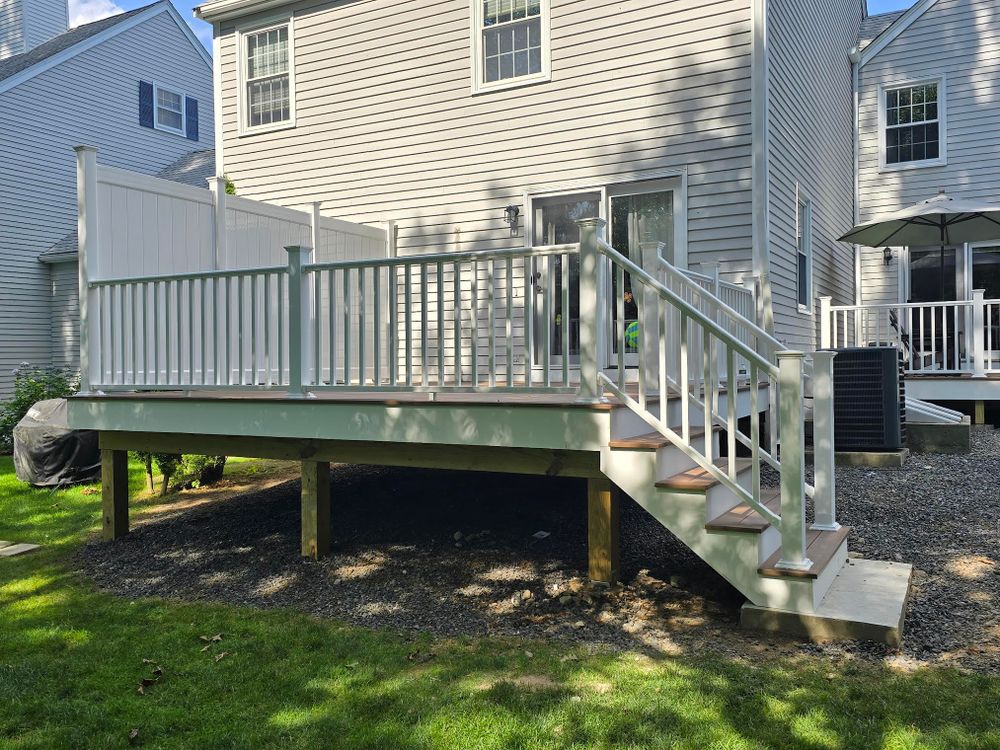 Transform your outdoor living space with our expert deck & patio installation service! Enhance your home's appeal with beautiful, durable decks that provide the perfect setting for relaxation or entertainment activities. for Jainer and Sons Inc. in Worcester, MA