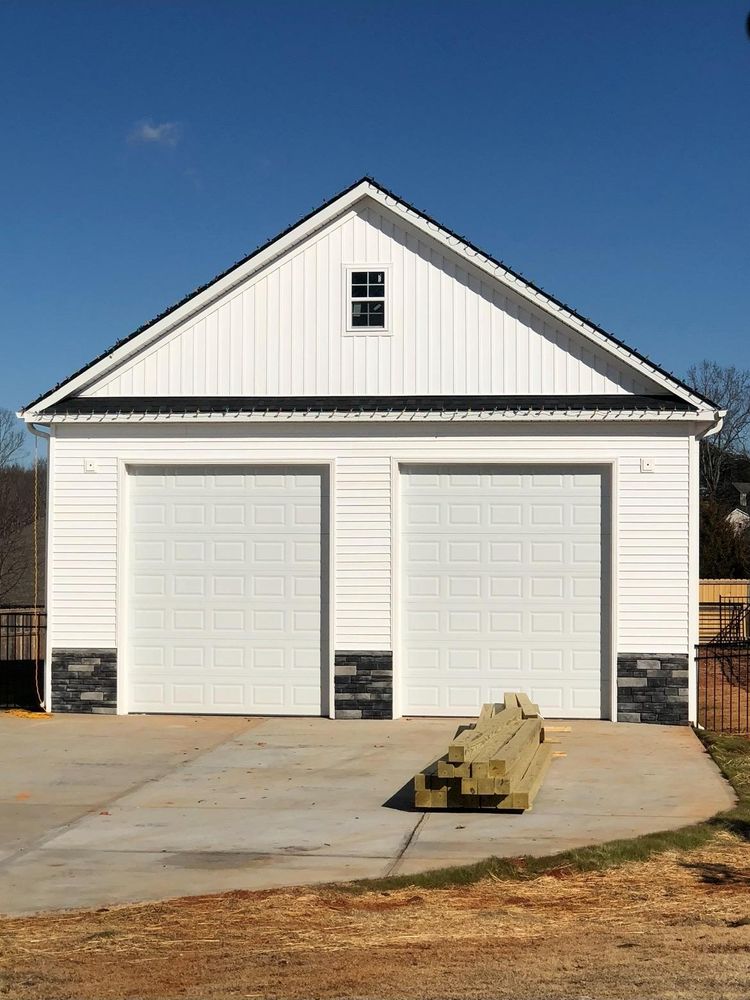 Enhance your home's curb appeal and durability with our expert vinyl siding house services, providing insulation and a stylish finish that withstands the elements while offering a low-maintenance solution for years to come. for Ninja Builders in Greer, SC