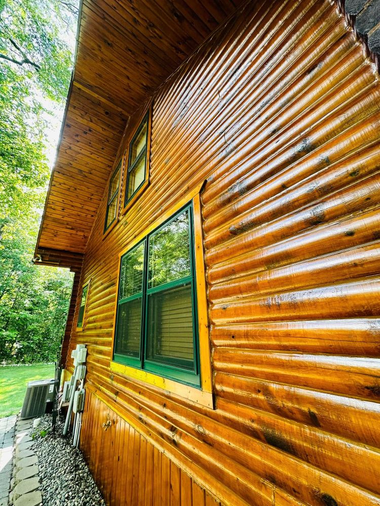 Transform your log home with our expert refinishing services, enhancing durability and aesthetic appeal. We clean, stain, and seal for long-lasting protection while preserving the natural beauty of your home. for Mr Moles Painting in Bemidji, MN