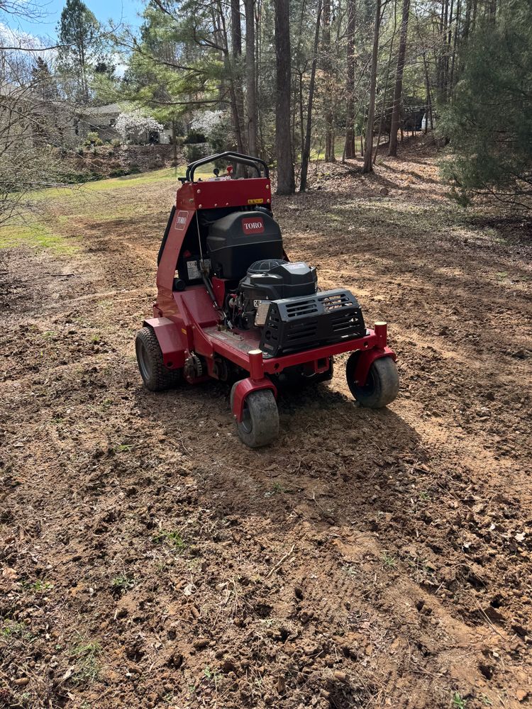 Our Lawn Aeration service improves soil health by reducing compaction and enhancing air circulation to roots, promoting lush growth for a healthier and more vibrant lawn. for Chavez Landscaping in Pittsboro, NC
