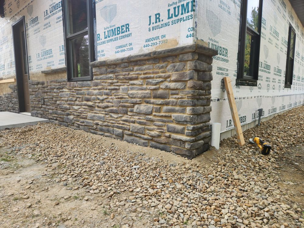 Our Masonry service offers expert craftsmanship for residential projects, including building and repairing patios, walkways, and retaining walls. We deliver durable, aesthetically pleasing solutions tailored to enhance your home's outdoor living spaces. for Davis Masonry in New Castle, PA