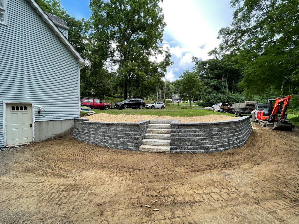 Our expert team specializes in retaining wall construction to enhance both the functionality and aesthetics of your outdoor space, providing stability and beauty for your landscaping needs. for NK Landscaping LLC in Dutchess County, NY