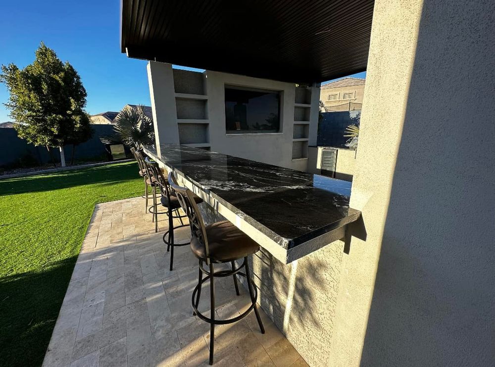 Transform your backyard with our custom Outdoor Kitchens, designed for functionality and style. Elevate your outdoor living experience with quality installations that enhance entertainment and dining in the comfort of your home. for Vix Landscape in Buckeye, AZ