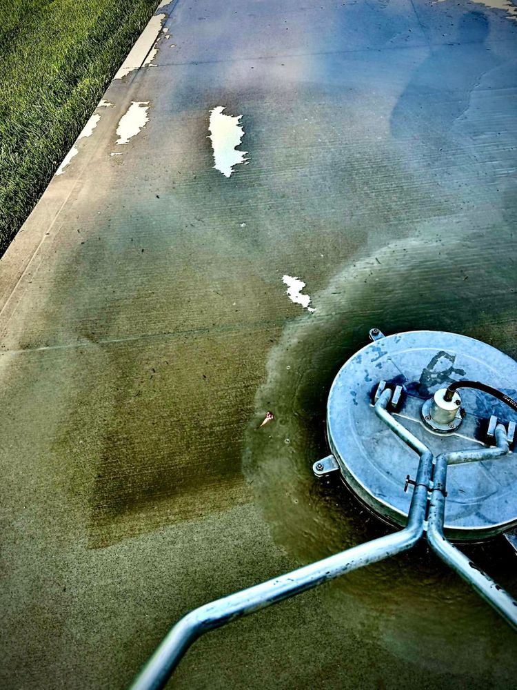 Enhance your home's curb appeal with our Concrete Sealing service, which protects against stains and weather damage, prolonging surface life while maintaining a fresh and clean appearance effortlessly. for Barnes Wash & Seal in Butler, OH