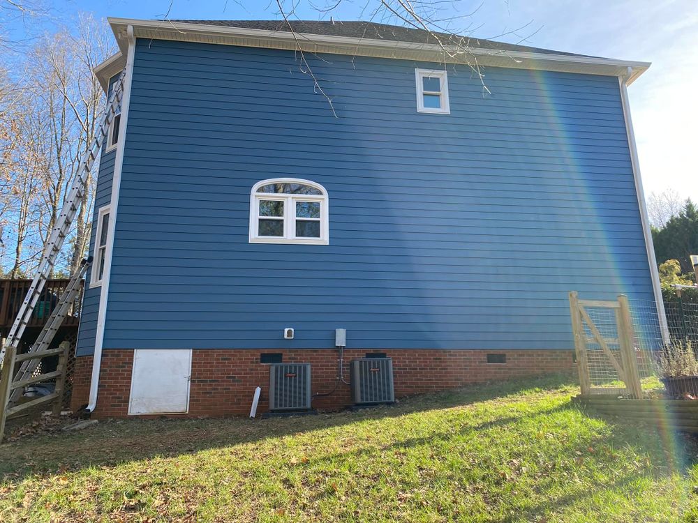 Enhance your home's aesthetic and durability with our expert vinyl siding services. Trusted by homeowners, we provide quality installations that offer long-lasting protection and style for your property's exterior. for Wa Alexandras Company in Charlotte, NC