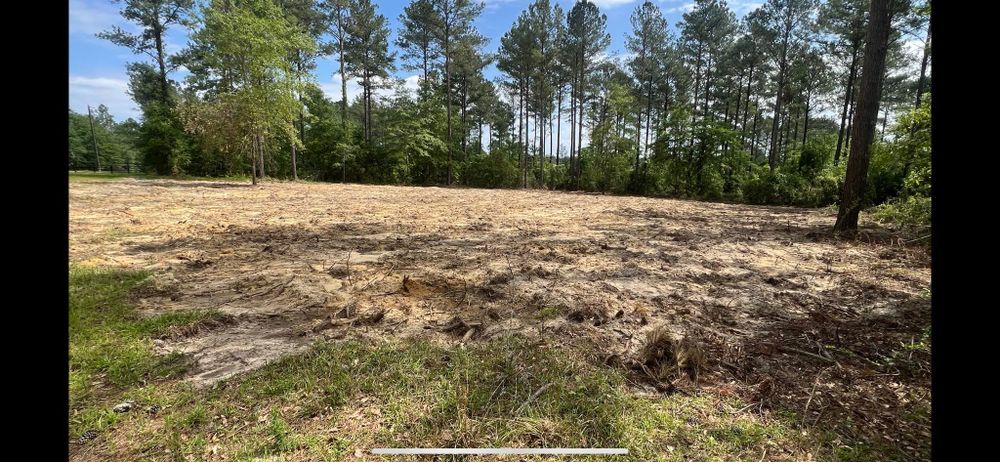 Our Leveling service ensures your landscape's safety and aesthetics by correcting uneven ground, preventing drainage issues, and providing a stable foundation for plants or future construction projects. for Thompson Forestry Mulching & Stump Grinding in Douglas, GA