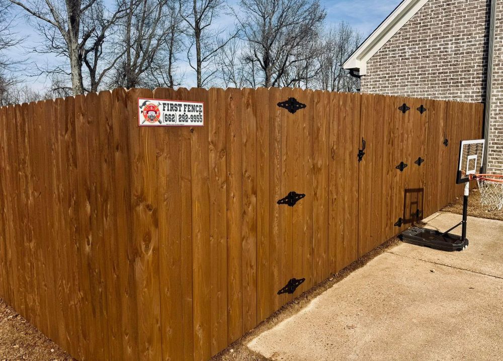 Our Fence Staining service enhances and protects your fence's appearance while extending its lifespan. Combined with expert fence repair, we ensure durability and beauty for your home's exterior. for First Fence LLC in Hernando, MS
