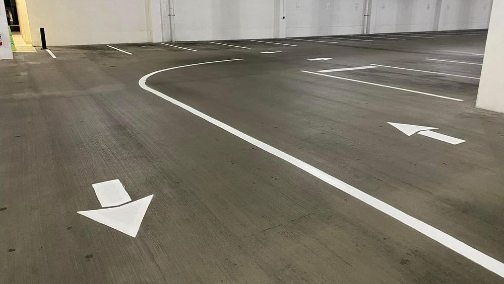 Our Parking Lot & Garage Maintenance service enhances safety and appearance by providing expert line striping, crack sealing, and regular upkeep, ensuring your space remains orderly and well-maintained for years to come. for Fine Line Striping and Pressure Washing in Missouri City, TX