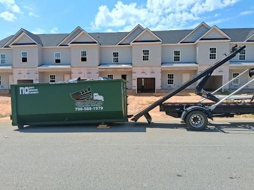 Our Construction Debris Removal service efficiently and responsibly handles the removal of any construction waste from your property, ensuring a clean and clutter-free space. for Evan's Property Investments and More in Hephzibah, GA