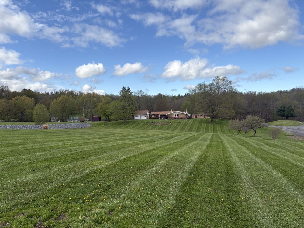 Discover the exceptional grounds care Schoharie County NY homeowners trust. Our expert team offers comprehensive mulch installation, ensuring vibrant, healthy landscapes that enhance your home's beauty and value year-round. for Fancher's Lawns & Landscaping LLC in Schoharie County, NY
