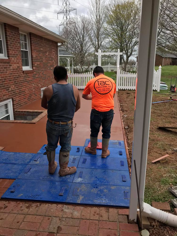 Our stamped concrete installation service offers homeowners the opportunity to add unique and decorative patterns to their outdoor spaces, creating a modern and visually appealing aesthetic that lasts for years. for Tac Concrete in Shelbyville, TN