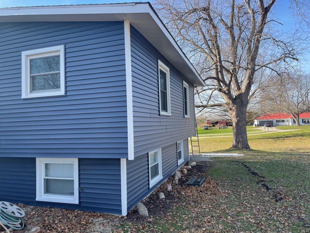 Our premium siding service enhances your home's exterior with durable and stylish options, expertly installed to protect and beautify your new construction for years to come. for New Vision Construction Company in Fort Wayne, IN