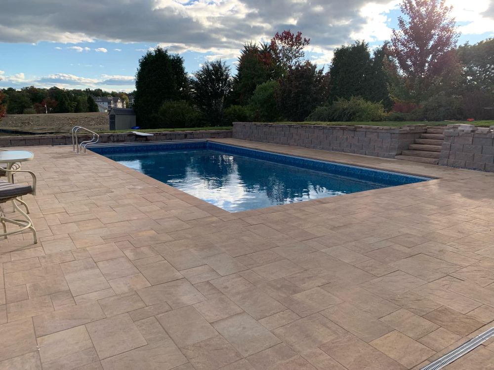 Elevate your outdoor space with our Patio Design & Construction service, creating stunning, durable patios that enhance functionality and beauty, tailored to fit your unique style and home's landscape. for Horizon Construction in Covington, VA