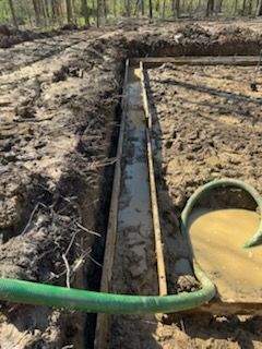 Our trenching service efficiently creates precise channels for utilities and drainage, ensuring safety and reliability. Trust our expertise to enhance your property's infrastructure with minimal disruption and maximum care. for Walley Construction LLC  in Hubbard, OH