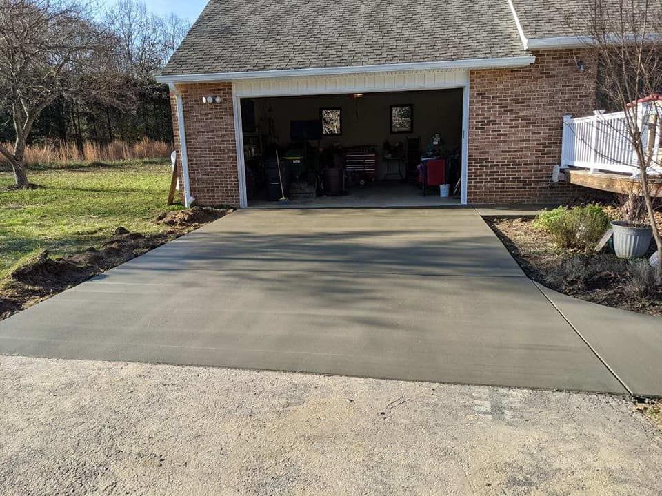 Transform your home with our comprehensive Driveway Design & Build service. Our expert team will create a durable and visually appealing concrete driveway tailored to enhance the beauty of your property. for JD's Concrete LLC in Dameron, MD