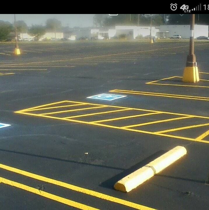 Enhance your property's safety and aesthetics with our expert striping services, providing clear, professional markings for driveways and parking areas to ensure organized traffic flow and optimal use of space. for Affordable Asphalt Maintenance in Indianapolis, IN