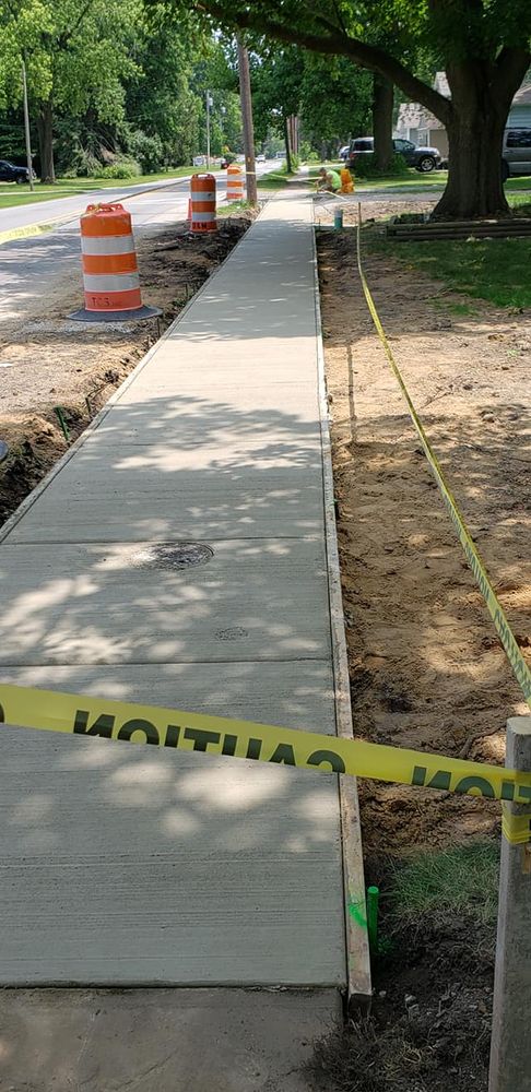 Our Sidewalk Installation service ensures durable, attractive walkways tailored to your home. We use top-quality materials and expert craftsmanship to enhance curb appeal and ensure safe, long-lasting pathways for your family. for B & E Concrete in Michigan City, IN