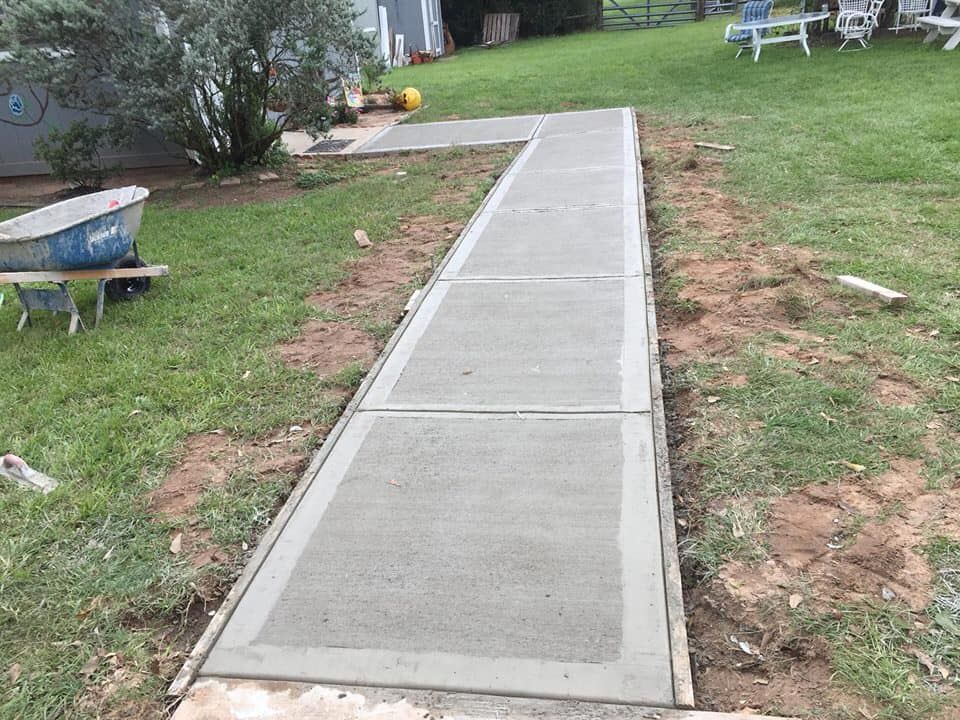 Enhance your home's curb appeal and functionality with our professional Sidewalk Installation service. Our experienced team will expertly install durable and visually appealing sidewalks to improve your property. for Central America Concrete Works in Eaglelake, TX