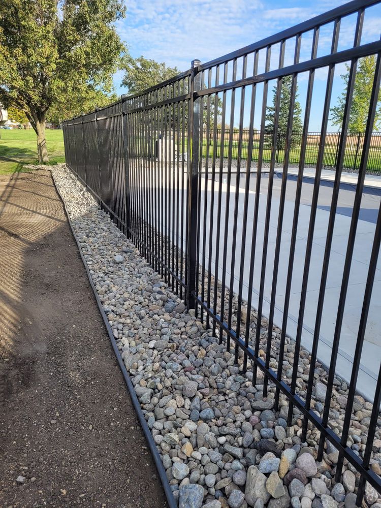 Enhance your outdoor space with our expert hardscaping services, providing durable and visually appealing features such as patios, walkways, retaining walls, and more to elevate your property's aesthetics. for Brownstone Grading in Perry, IA