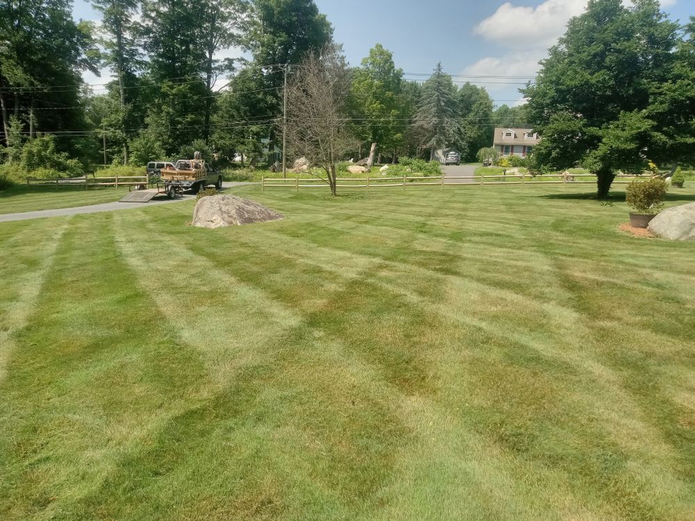 Our professional mowing service ensures your lawn is expertly trimmed and maintained, enhancing the overall beauty of your property and creating a well-manicured outdoor space for you to enjoy. for K Brown's Property Maintenance in Pittsfield, MA