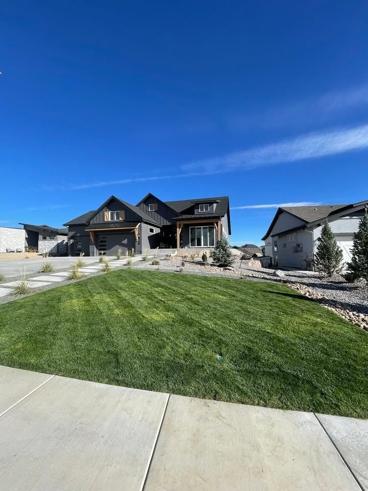 Enhance your home's beauty with our expert Landscape Design & Installation service, featuring tailored solutions that transform outdoor spaces into stunning, functional sanctuaries with lush greenery and elegant hardscape elements to suit your style. for Pikes Peak Landscaping in Colorado Springs, CO