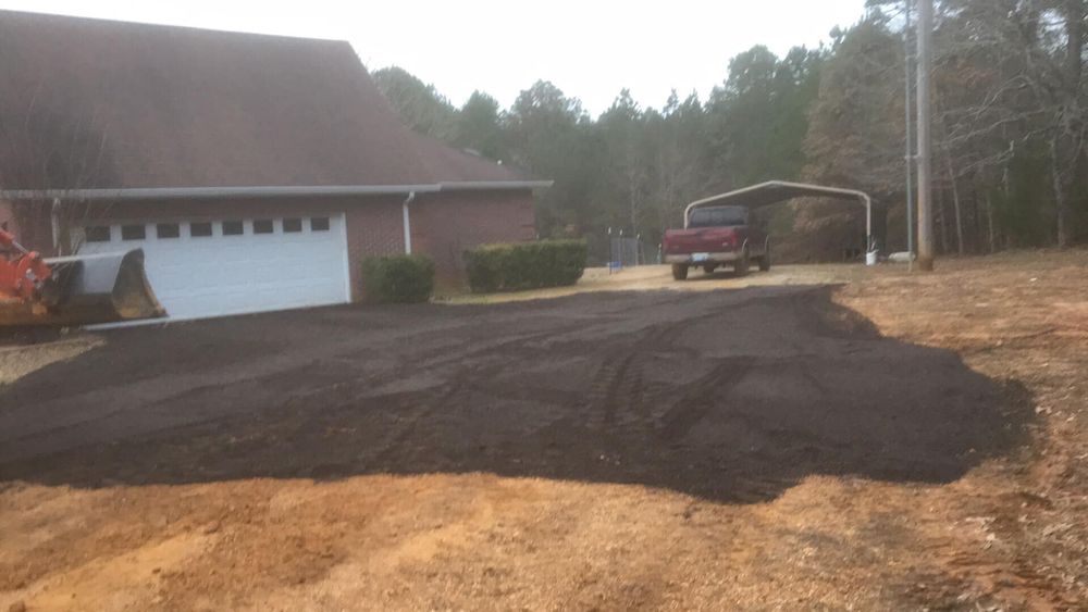 Our House Pads service includes preparing your land for construction by clearing trees, brush, and debris to create a level foundation. Trust us to efficiently and precisely clear your property. for H&H Dirt Work in Corinth, MS