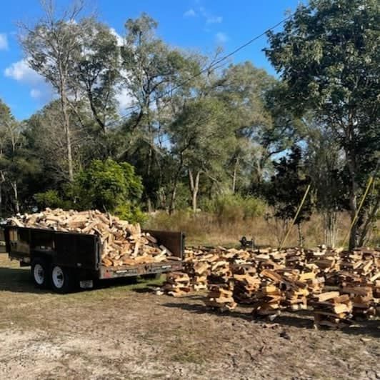 Stay warm with our premium quality seasoned firewood near you. Our tree services company offers convenient delivery of dry, well-aged firewood to enhance your home heating experience during winter. for Daniel Hickey’s Tree Service in DeLand, FL