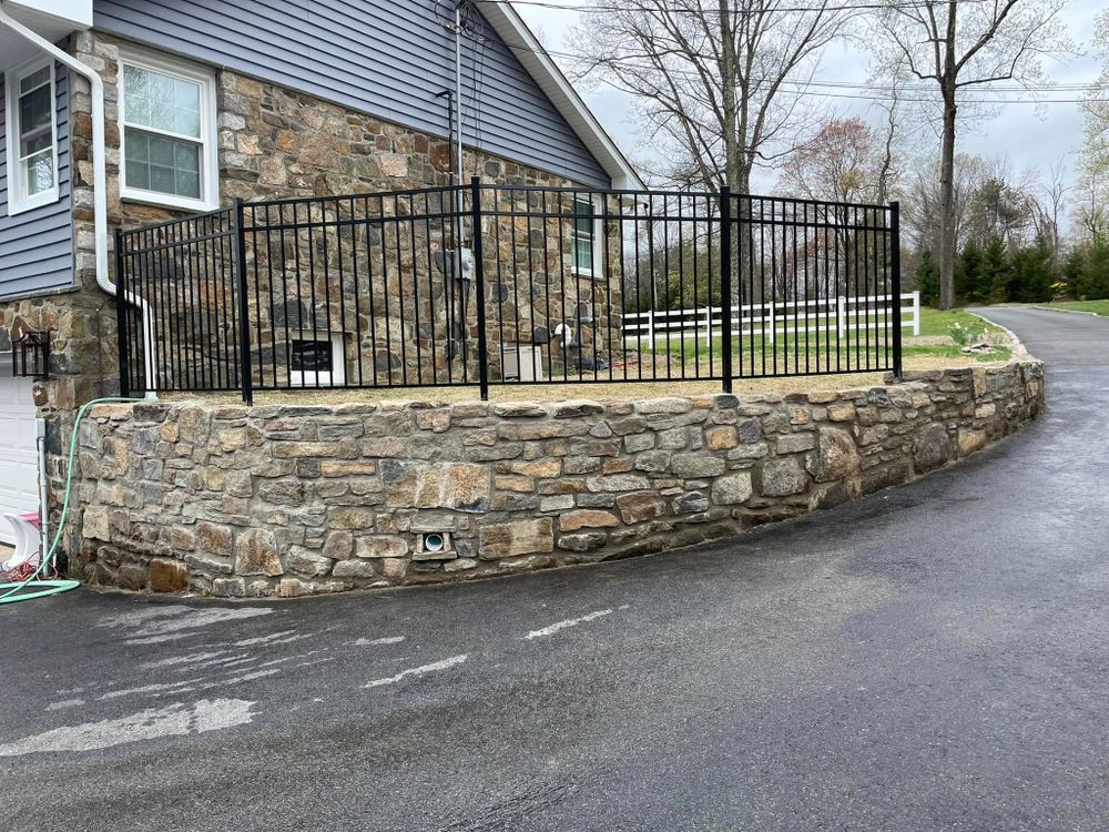 Our Retaining Wall Construction service enhances your property's beauty and functionality, providing sturdy, visually appealing solutions to prevent soil erosion while seamlessly integrating with your existing landscape design. for DNA Landscapes in Hackettstown, NJ