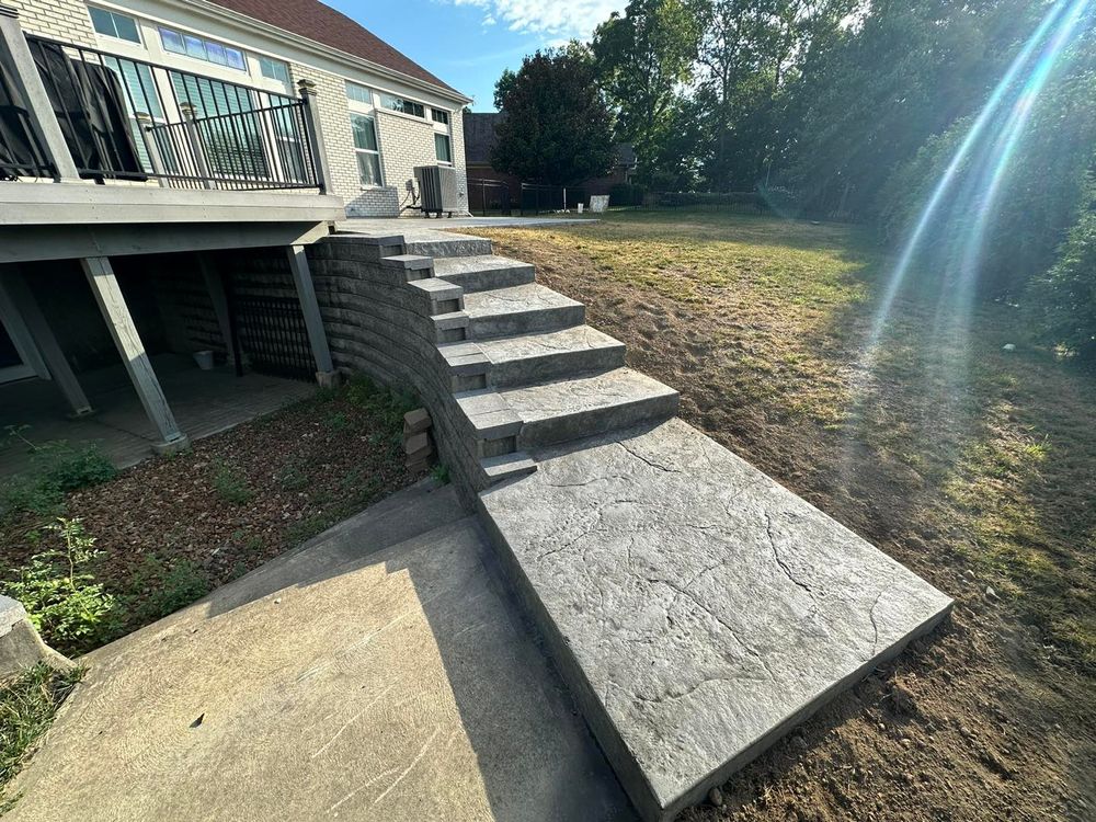 Our Stair Design & Installation service offers homeowners the opportunity to enhance their property with durable and stylish concrete stairs, expertly crafted to elevate aesthetic appeal and improve functionality in any space. for Tanenbaum Services & Concrete in Florence, KY